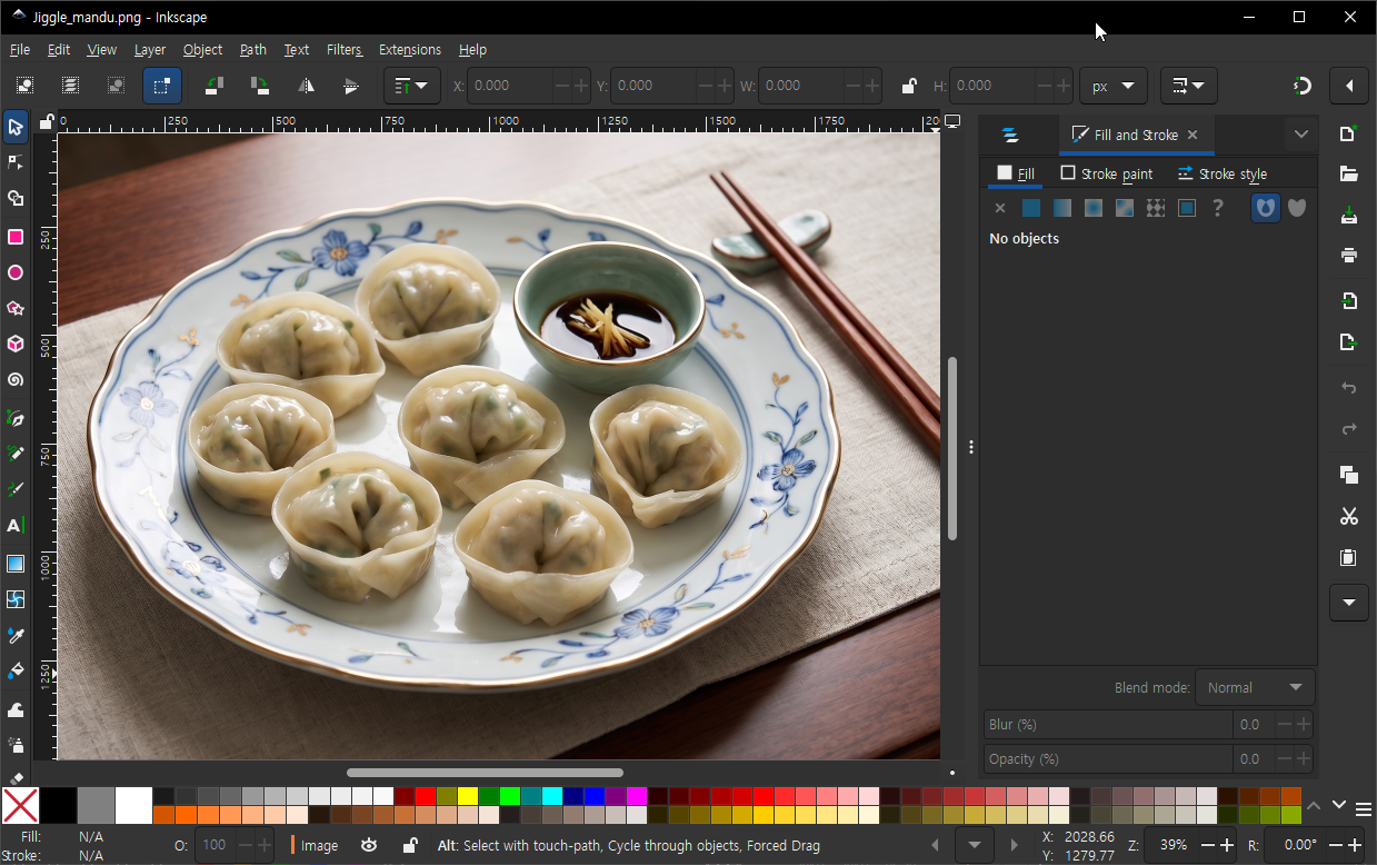 Inkscape with a reference photo and vector editing toolbar