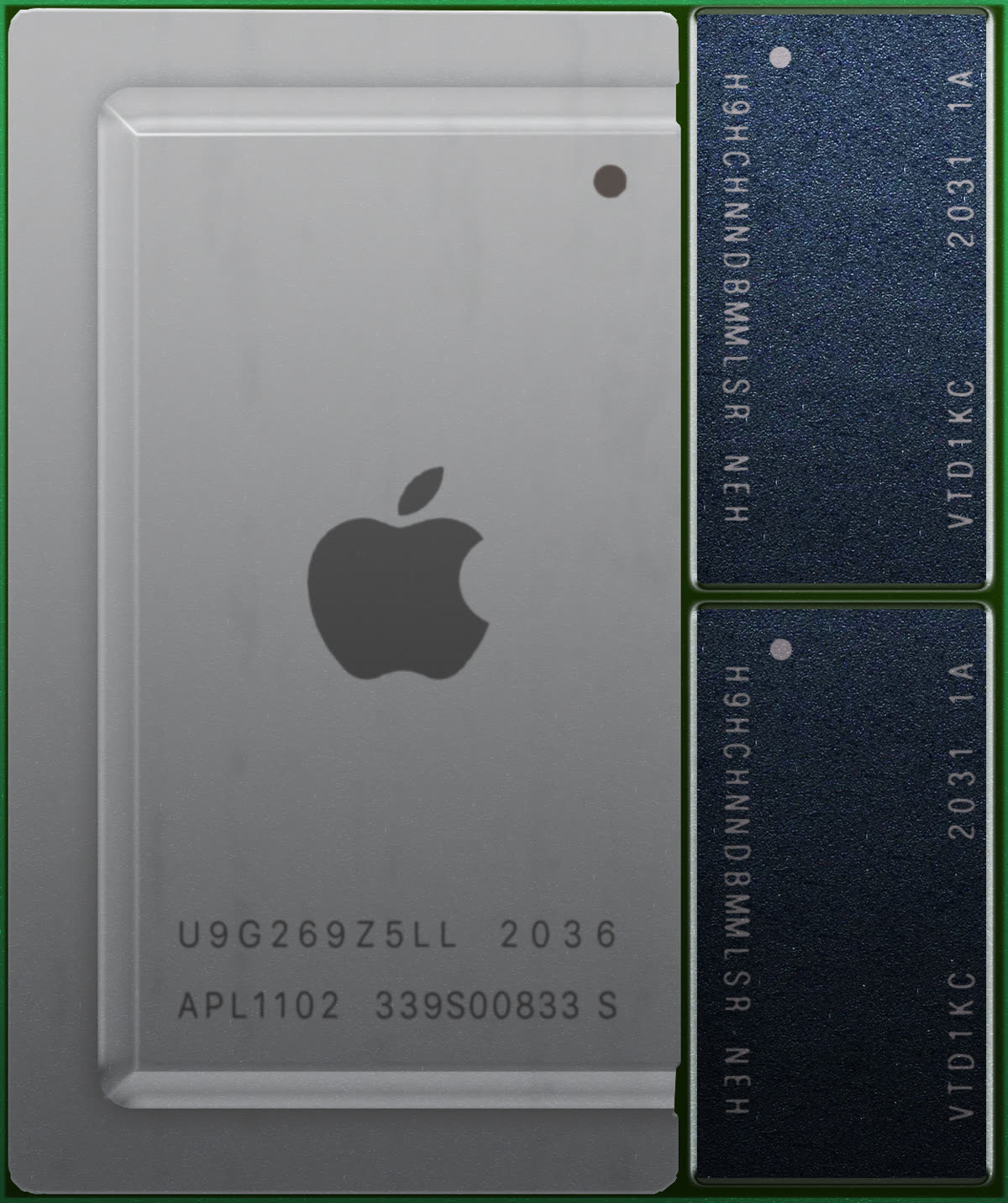 The Apple M1 system-on-chip package alongside two LPDDR memory modules on a green PCB